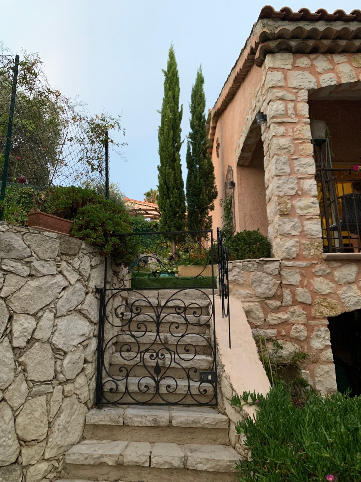 Entrance gate with stone steps