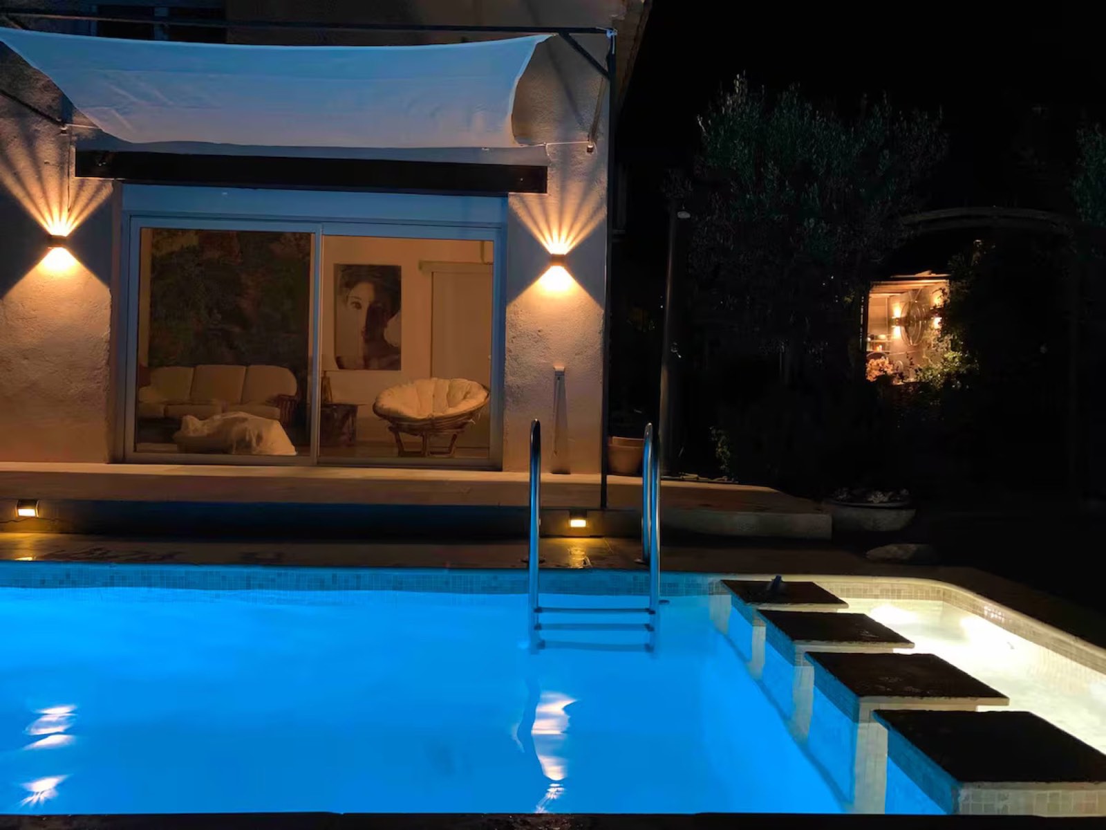 Pool and villa at night