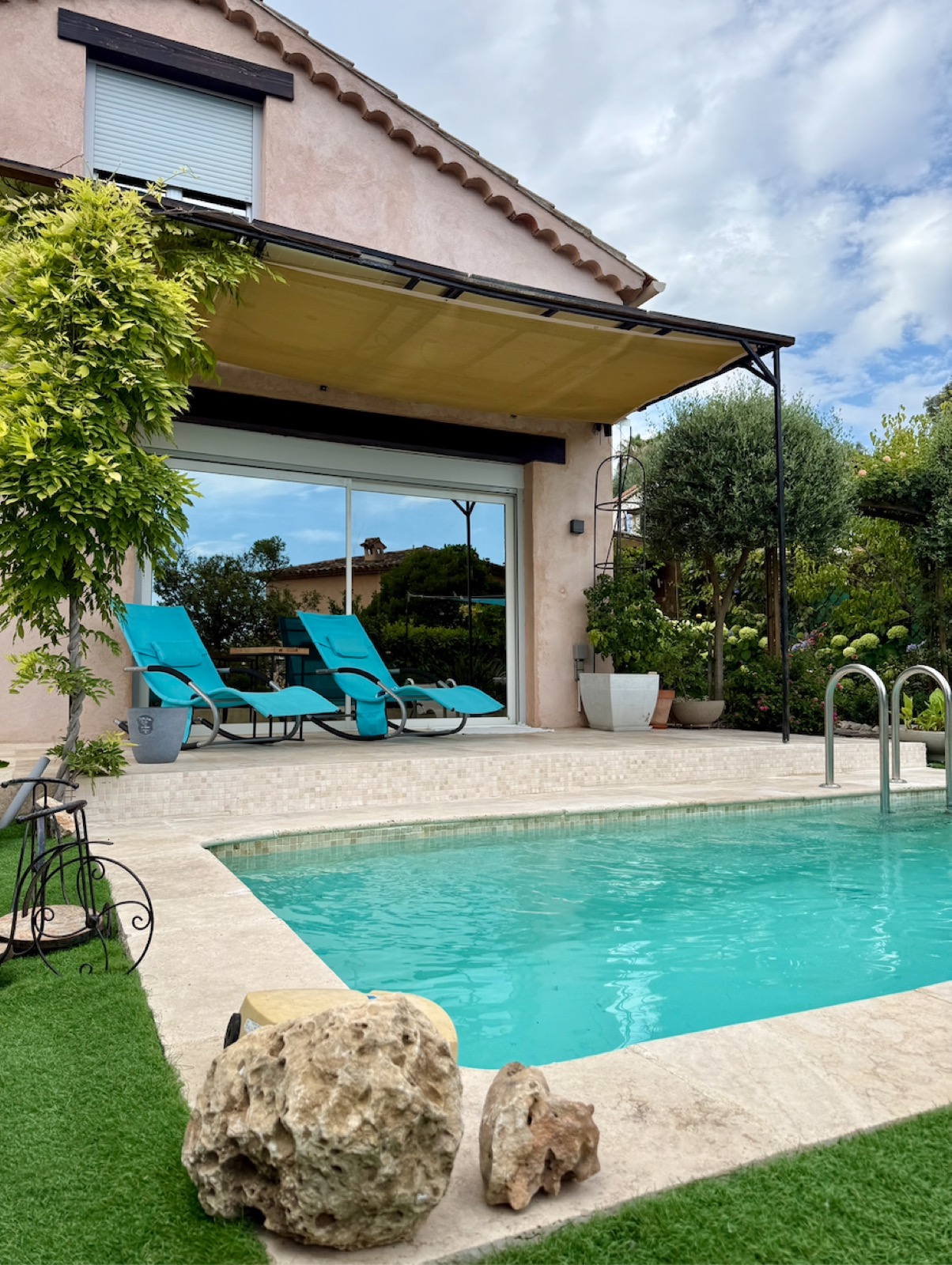 Pool patio with sun awning