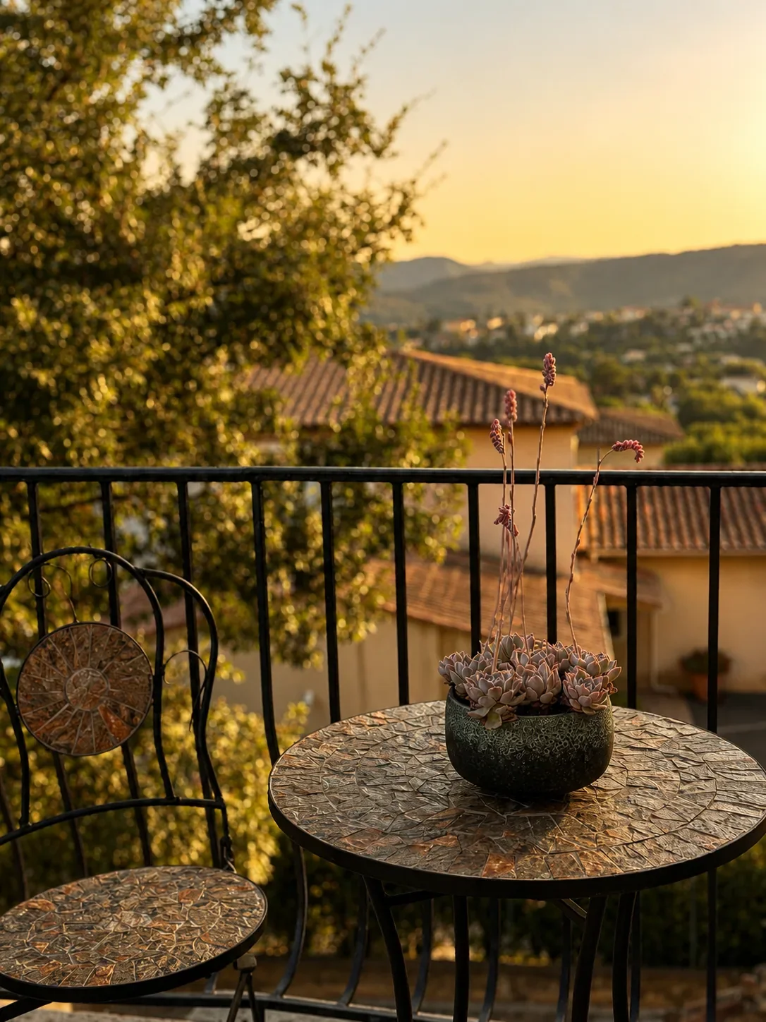 Sunset balcony table and Riviera hillside view at Villa Augflor