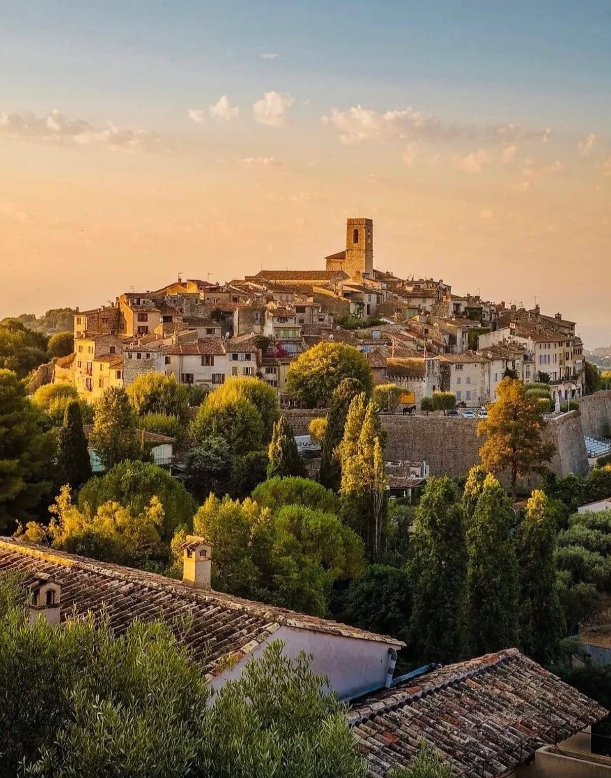 Saint-Paul-de-Vence hilltop village and stone ramparts in golden evening light